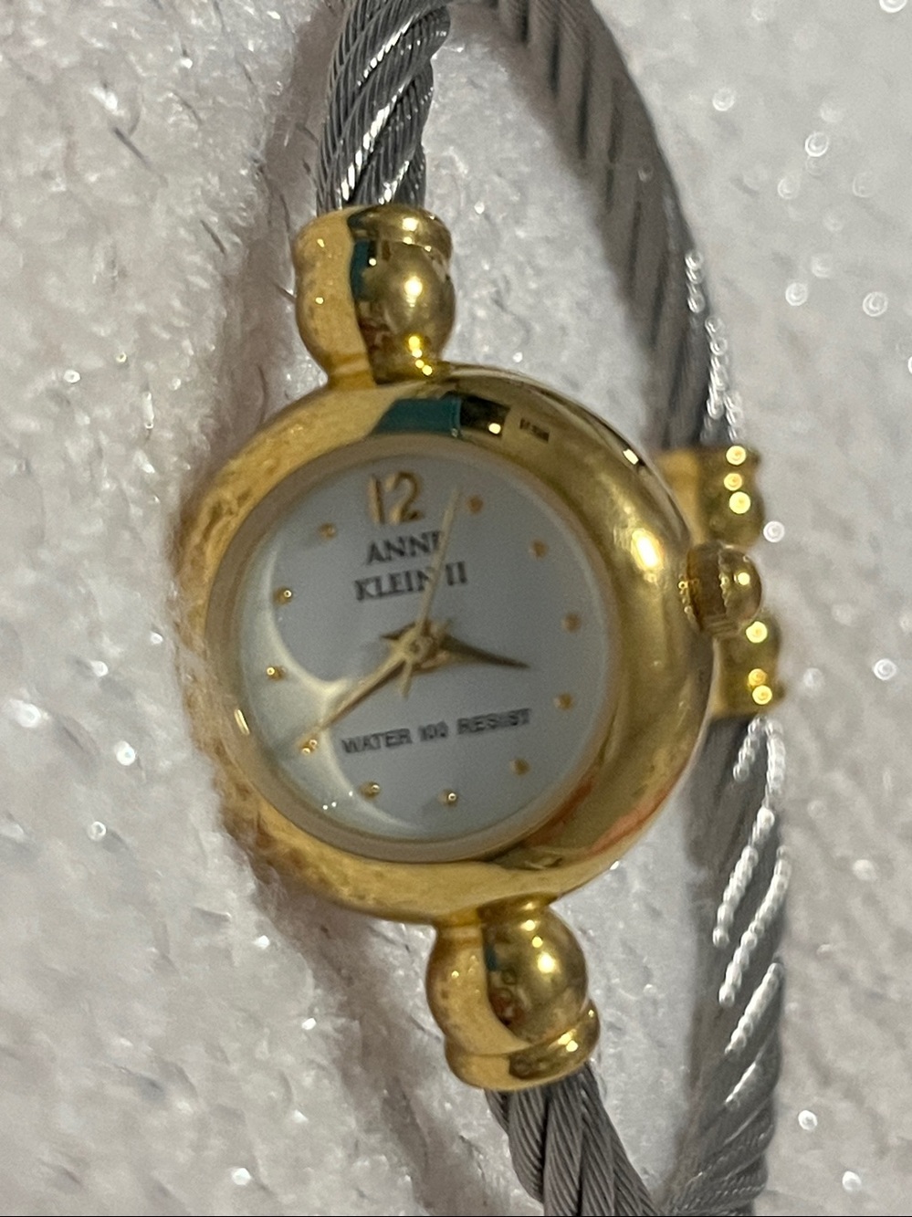 Anne Klein Two-Tone Cable Bangle Watch in Gold and Silver